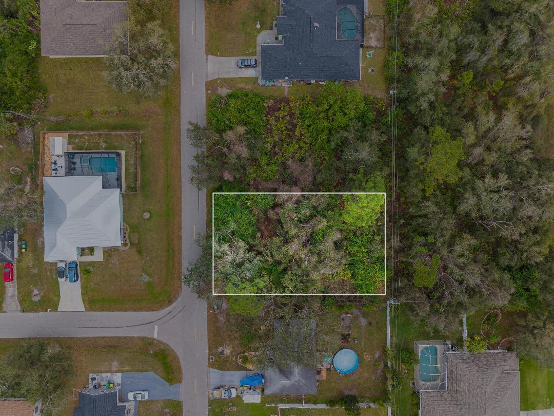 Stunning lot available to build your dream home in beautiful Port Charlotte, FL! This spacious property offers plenty of room for a pool, RV, or boat, with easy access to nearby boat ramps, Larry Taylor Kiwanis Park, golf courses, shopping, and dining. Best of all, No HOA and it's not in a flood zone! Don't miss your chance to own a piece of Florida paradise, come see it today!