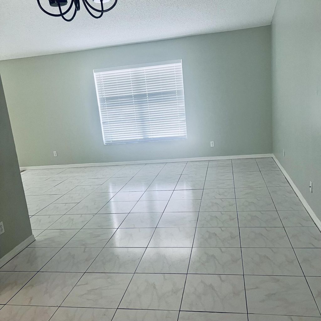 Photo of 6911 NW Dorothy Street, Port Saint Lucie, FL 34983 (MLS # B26011378)