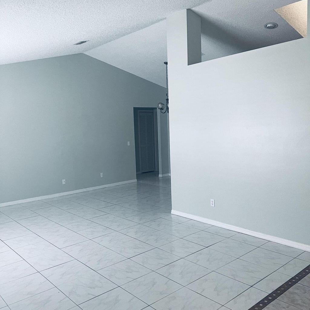 Photo of 6911 NW Dorothy Street, Port Saint Lucie, FL 34983 (MLS # B26011378)