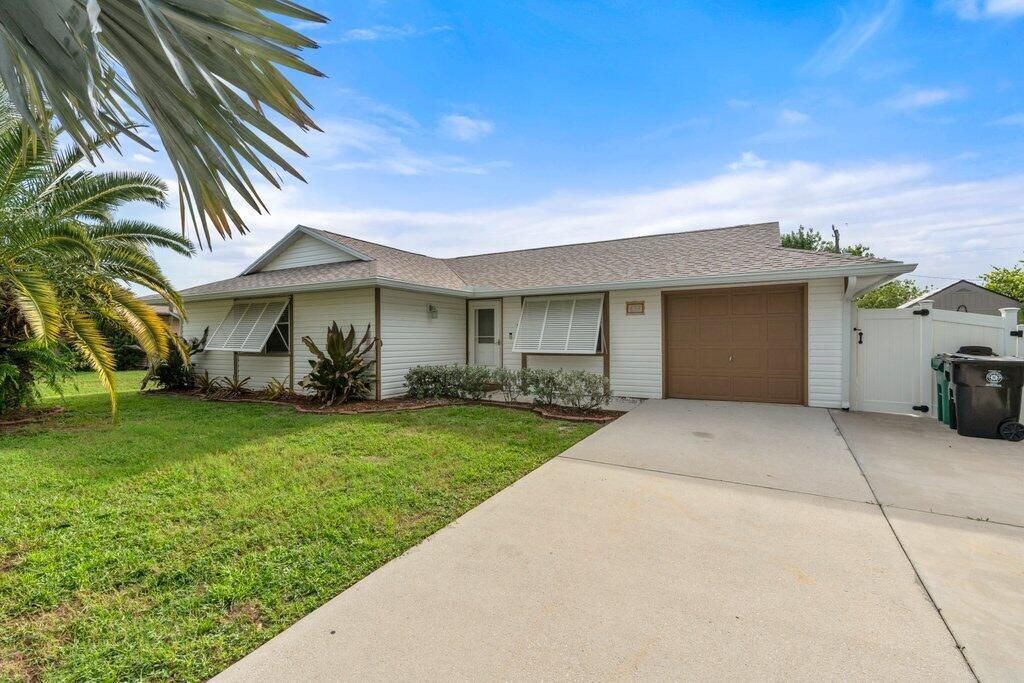 Photo of 637 SW Granadeer Street W, Port Saint Lucie, FL 34983 (MLS # R11009946)