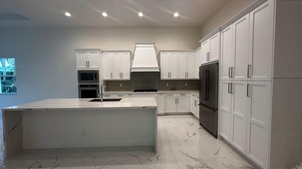 Photo of 9256 Crestview Circle, Palm Beach Gardens, FL 33412 (MLS # R10945736)