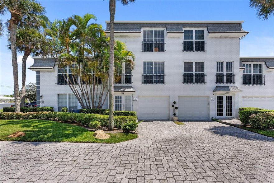 Located in prestigious Hillsboro Mile at the exclusive Hillsboro Beach and Yacht Club, this beautifully maintained three story townhome with attached one car garage is not to be missed! Remodeled kitchen with stainless steel appliances. Third floor consists of two primary bedrooms & baths w/walk-in closets. Second floor has expansive living area with a formal dining room, bathroom, and large eat-in kitchen. First floor has a large private room for guest/office/theatre with bathroom/shower and sliding glass doors to covered patio. Plantation shutters throughout. Community offers access to private beach!, tranquil pool, hot tub, & tennis court. Boat dockage available with access to Intracoastal. Come and wake up everyday in a vacation!