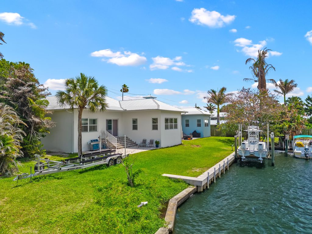 Photo of 2534 SW Conch Cove Lane, Palm City, FL 34990 (MLS # B26025860)