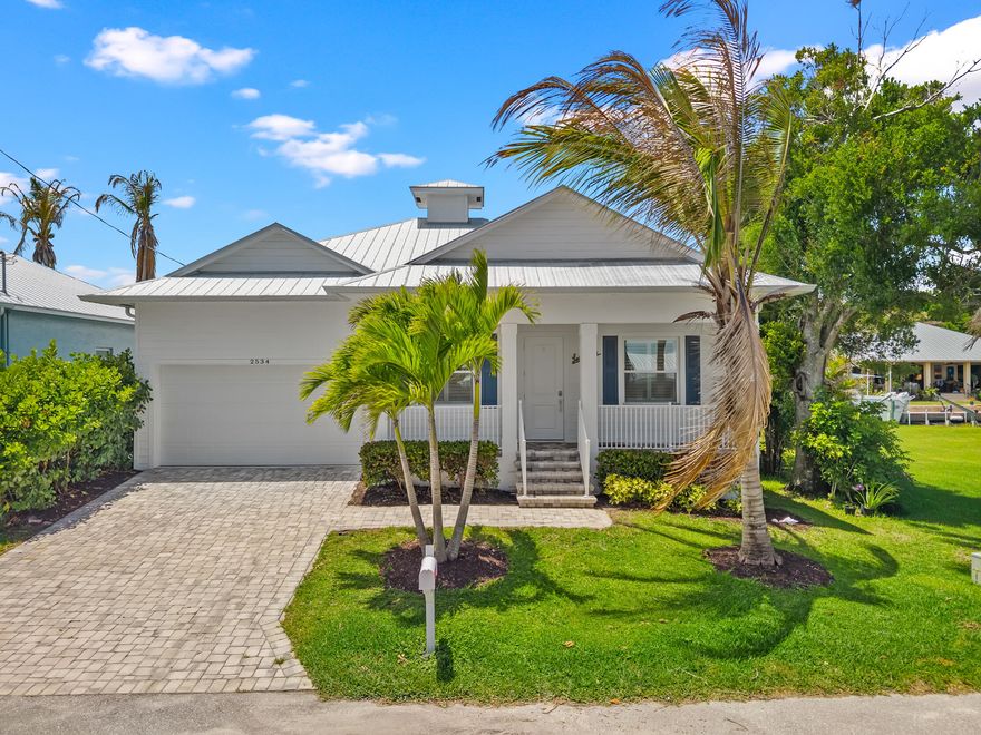 LUXURY + LOCATION! Boater's dream waterfront home on a quiet dead-end street with beautiful river views, private boat lift, and brand-new seawall. This stunning Key West-inspired home offers exceptional attention to detail, luxury finishes, and quality new construction throughout. Property is deeded to the center of the canal with easement access and offers direct ocean access, boating, fishing, and coastal living at its finest. Rare opportunity for a waterfront home with boat dock, canal frontage, and river access — one of the best values in luxury waterfront real estate. Perfect as a primary residence, vacation home, Airbnb, or investment property. All information pertaining to the property is deemed reliable, but not guaranteed. Information to be verified by the Buyer. Be advised that cameras may exist recording audio and video inside/outside the property, such as ring doorbells. Photos are digitally enhanced and could be altered, please verify.