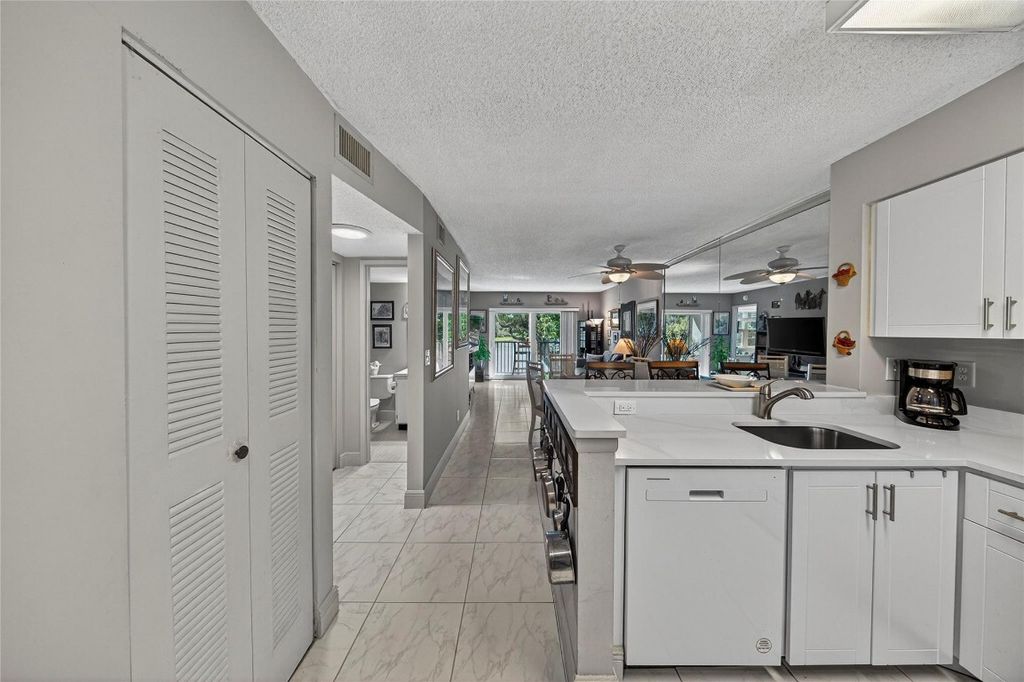 Photo of 2222 N Cypress Bend Drive #201, Pompano Beach, FL 33069 (MLS # F10537219)