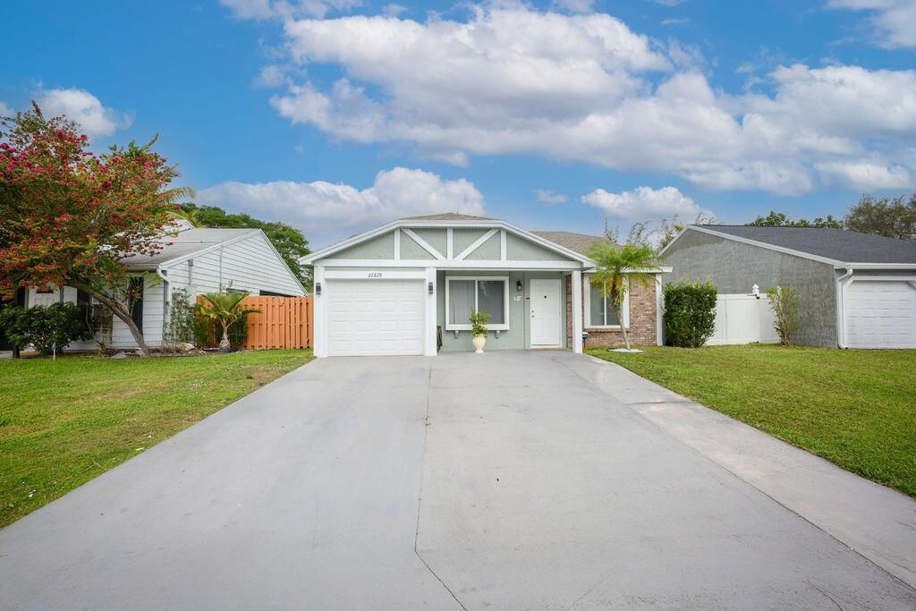 Photo of 22829 N Sandalfoot Boulevard, Boca Raton, FL 33428 (MLS # R11051658)