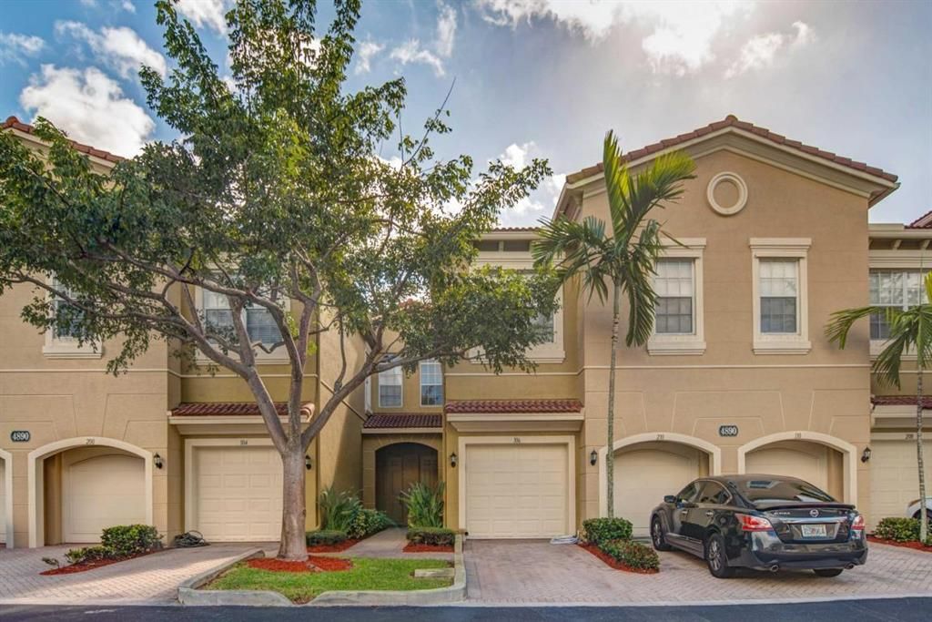 Photo of 4891 Bonsai Circle #107, Palm Beach Gardens, FL 33418 (MLS # R10736077)