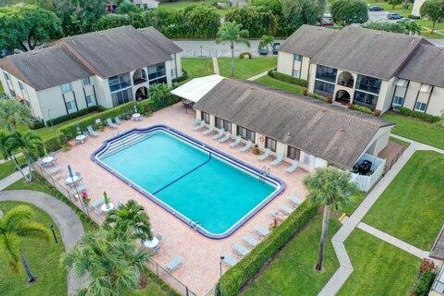 Motivated Seller guarantees you the BEST DEAL on the Market. All Offers Accepted. There's Room to negotiate. This is a Fix & Flip so you benefit more the quicker you act. Owner is not interested in a long drawn out back and forth. Come snatch up this special unit immediately. You won't be disappointed. Owner guarantees your Satisfaction. Welcome to La Pinata, a peaceful 55+ community. This 2-bedroom, 1.5-bath second-floor unit is attractively priced and ready for you to make it your own. Enjoy the enclosed front porch perfect for relaxing with morning coffee. Inside, you'll find new carpet throughout. The kitchen offers a large walk-in pantry, and there's an in-unit utility/laundry room with a washer and dryer. Community amenities include a pool, clubhouse, and shuffleboard. Move-in ready