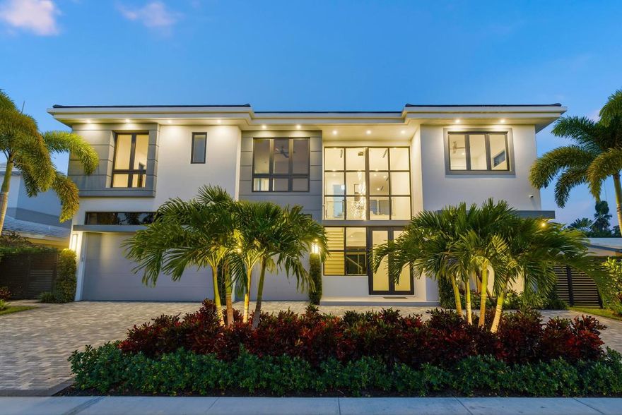 This extraordinary two-story estate is purpose-built for those who live life by the Boca lifestyle. Perfectly situated in the heart of Mizner Park, you're just a 5-minute drive to the iconic Boca Raton Resort & Club, and the beaches ''putting the best of South Florida at your fingertips. Inside, the vibe is effortlessly elevated. The expansive open-concept layout blends living, dining, and kitchen spaces into one seamless, sunlit canvas perfect for casual lounging or lively entertaining.

Adjacent to the main gathering space, a sleek clubroom invites cocktails, game nights, or simply a quiet moment to unwind. The main floor hosts a private guest suite (or home office), offering flexibility and seclusion. When it's time to head upstairs, the elevator makes it easy. There you'll find a second living area that opens to a private balcony with panoramic views, plus four additional ensuite bedrooms - each with oversized, custom closets.

The primary suite is the showstopper; a serene retreat with dual water closets, a spa-sized shower, and generous dressing areas fit for both function and fashion.

Outdoors, the luxury continues: a sparkling pool, relaxing spa, and accent lighting. Home is complete with a whole home generator, pool with salt system and heater, Wolf & Subzero appliances, summer kitchen, all custom closets, and much more.