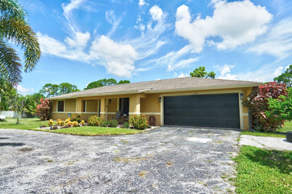 Photo of 16113 E Cheltenham Drive, Loxahatchee, FL 33470 (MLS # R11008438)