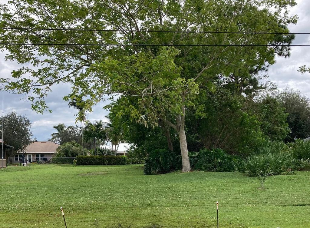 Photo of 545 SW Duval Avenue, Port Saint Lucie, FL 34983 (MLS # R10856045)