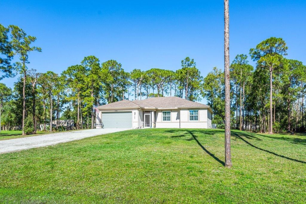 Photo of 12861 67th Street N, West Palm Beach, FL 33412 (MLS # R10955091)