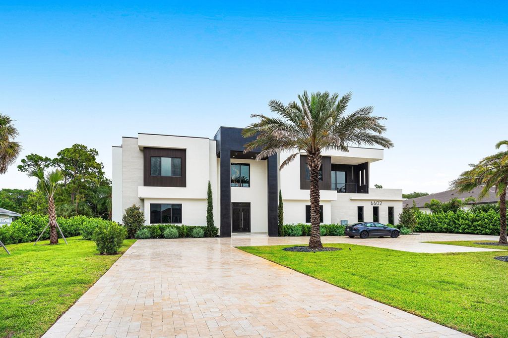 Photo of 6602 NW 62nd Terrace, Parkland, FL 33067 (MLS # B26020831)