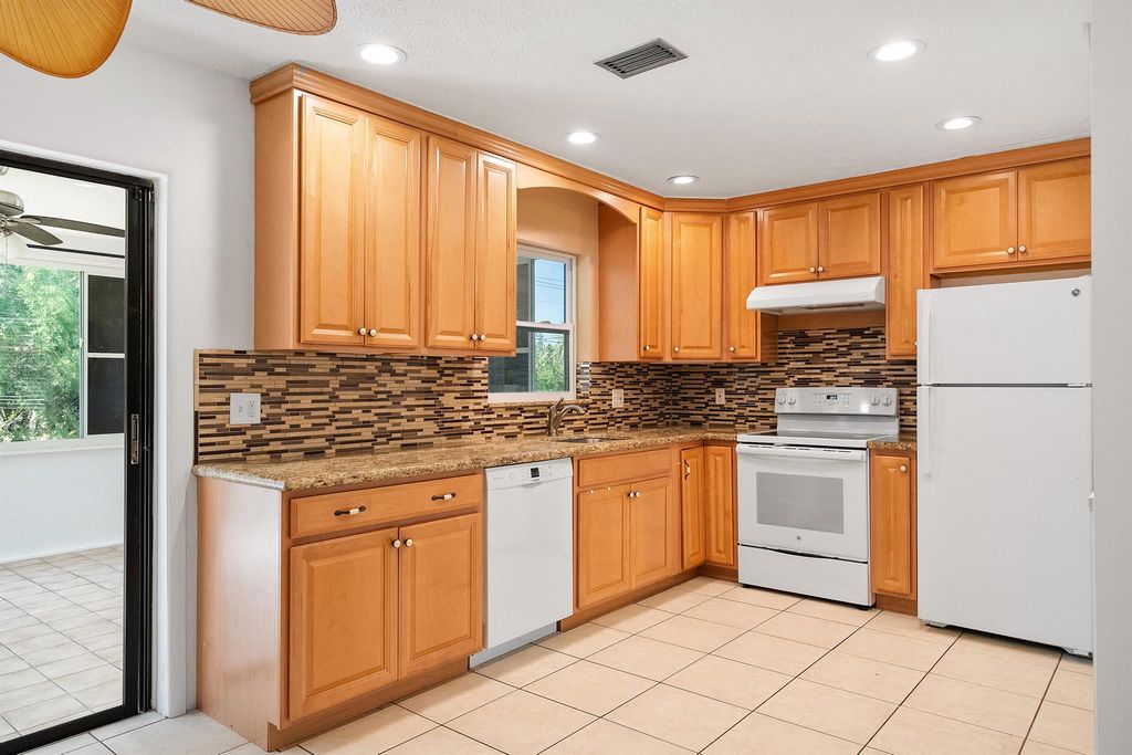 Photo of 3023 SE Bamboo Street, Stuart, FL 34997 (MLS # R11084823)