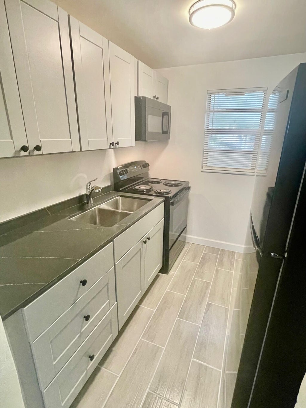Photo of 22 NW 8TH Avenue #1-4, Dania Beach, FL 33004 (MLS # B26057821)