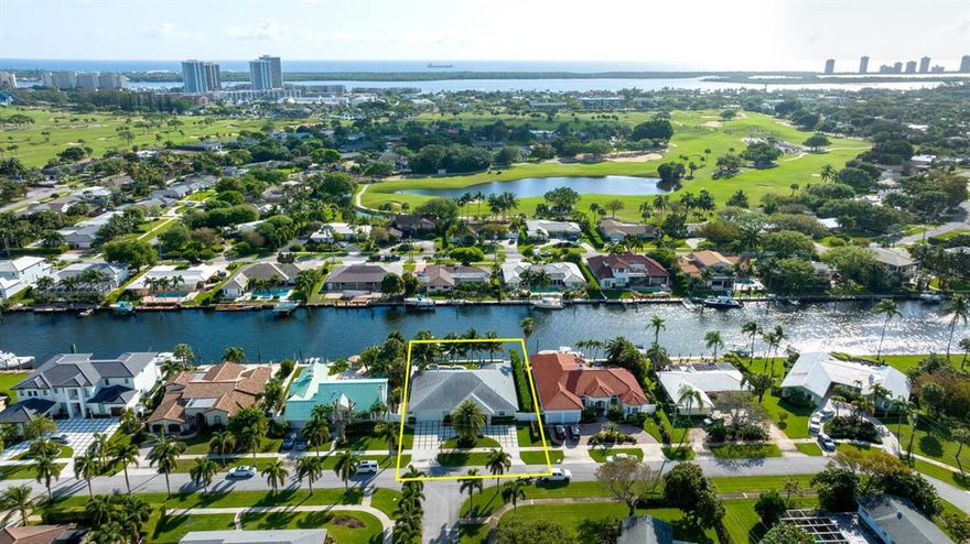 Completely renovated waterfront home in the highly sought-after Village of North Palm Beach. 4-bedroom, 3 1/2 bath, oversized 2 car garage, with pool and spa. Total sq. ft. 4,453, Living sq. ft. 3,014. Some of the highlights include covered entry with tongue and groove ceilings, circular driveway, impact windows and doors, recessed lighting, porcelain wood plank tile throughout, alarm system, newer light fixtures, built ins and crown molding. Kitchen has oversized center island, calacatta countertop, white shaker cabinets, 32'' Frigidaire Professional side by side S/S Fridge and Freezer, Bertazzoni 6 burner gas stove and oven, Bosch dishwasher, pantry with pull-out drawers and undermount  S/S sink.  Bar area includes wine cooler, ice maker, and plumbing available to add a sink. Master bedroom has sliders for private entry to pool and spa and walk in closets. Master bath has double vanity with granite countertop, tub and shower with seamless glass door and tile and pebble floor. Guest bedroom has walk in closets and an en-suite bath that doubles as a cabana bath. Guest bedroom has a chandelier and walk in closet. Guest bathroom has single vanity and tub/shower combo. Den / 4th bedroom has double French door entry. There is also a convenient powder room. The laundry room has front load Whirlpool Duet Steam washer and dryer. Backyard includes newer saltwater pool and spa with coquina pavers, clusia hedges, mature coconut palms and covered lanai.  Summer kitchen has tongue and groove cypress ceilings, Sedona grill and large island with plenty of room for seating and storage.  Synthetic turf and gas firepit. 90' ft of waterfrontage with newer seawall and batter piles, 70' ft dock, and 10,000 lb. lift. Garage is equipped with storage, mini split A/C and large wine cooler. Home features a Kohler 48RCLC 48kW Generator. Over $1,000,000 in renovations between 2016 and 2021. The Village of North Palm Beach features several beautiful parks, such as Anchorage Park, with playgrounds, docks, volleyball courts, tennis courts, and a dog park. The Village is also home for the newly renovated North Palm Beach Country Club, featuring an Olympic swimming pool, splash pad, picnic area, an on-deck tiki hut, 200 seat banquet room, 100 seat Farmer's Table restaurant, A Jack Nicklaus Signature Golf Course, and a full featured Tennis Facility with Har-Tru courts. Close to beaches, recreation, dining, and entertainment. Easy access to major highways and Palm Beach International Airport.
