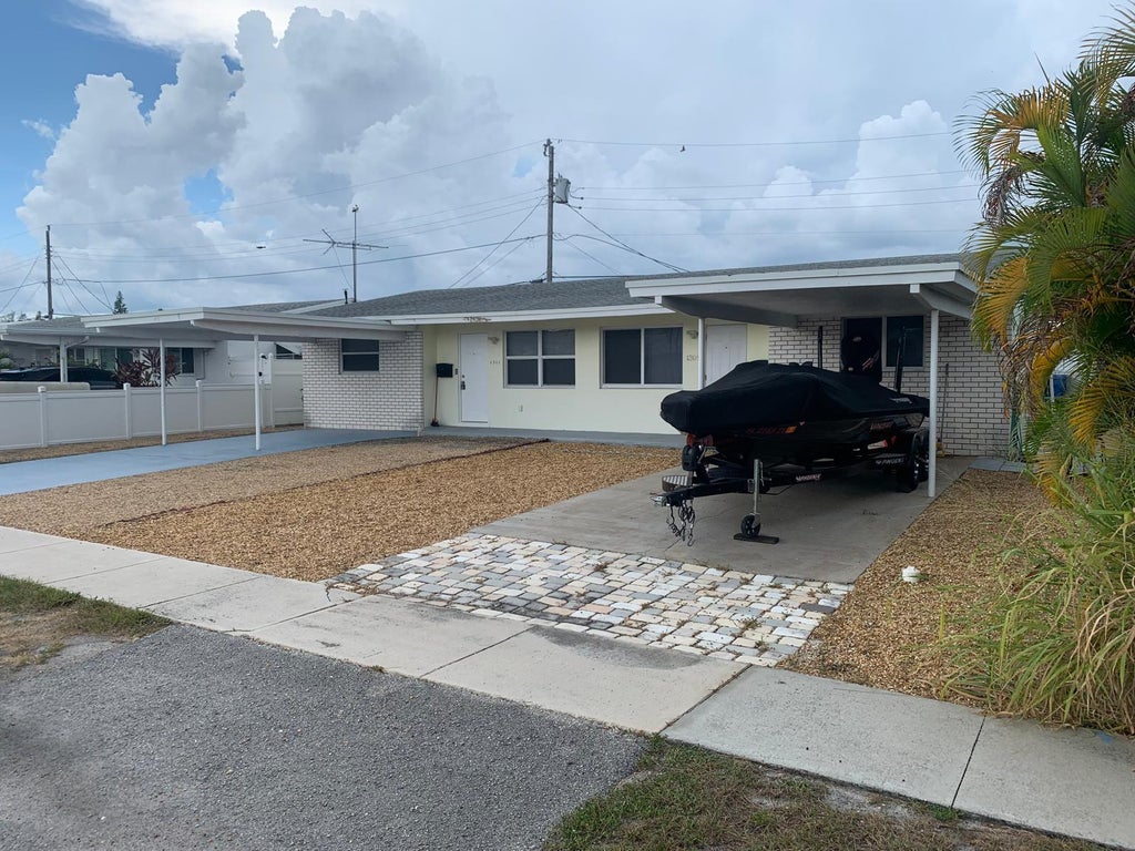Photo of 1311 Alho Drive, Lantana, FL 33462 (MLS # B26056893)