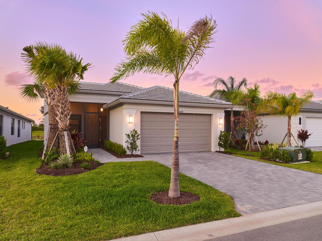 Photo of 12469 SW High Tide Road, Port Saint Lucie, FL 34987 (MLS # B26012195)