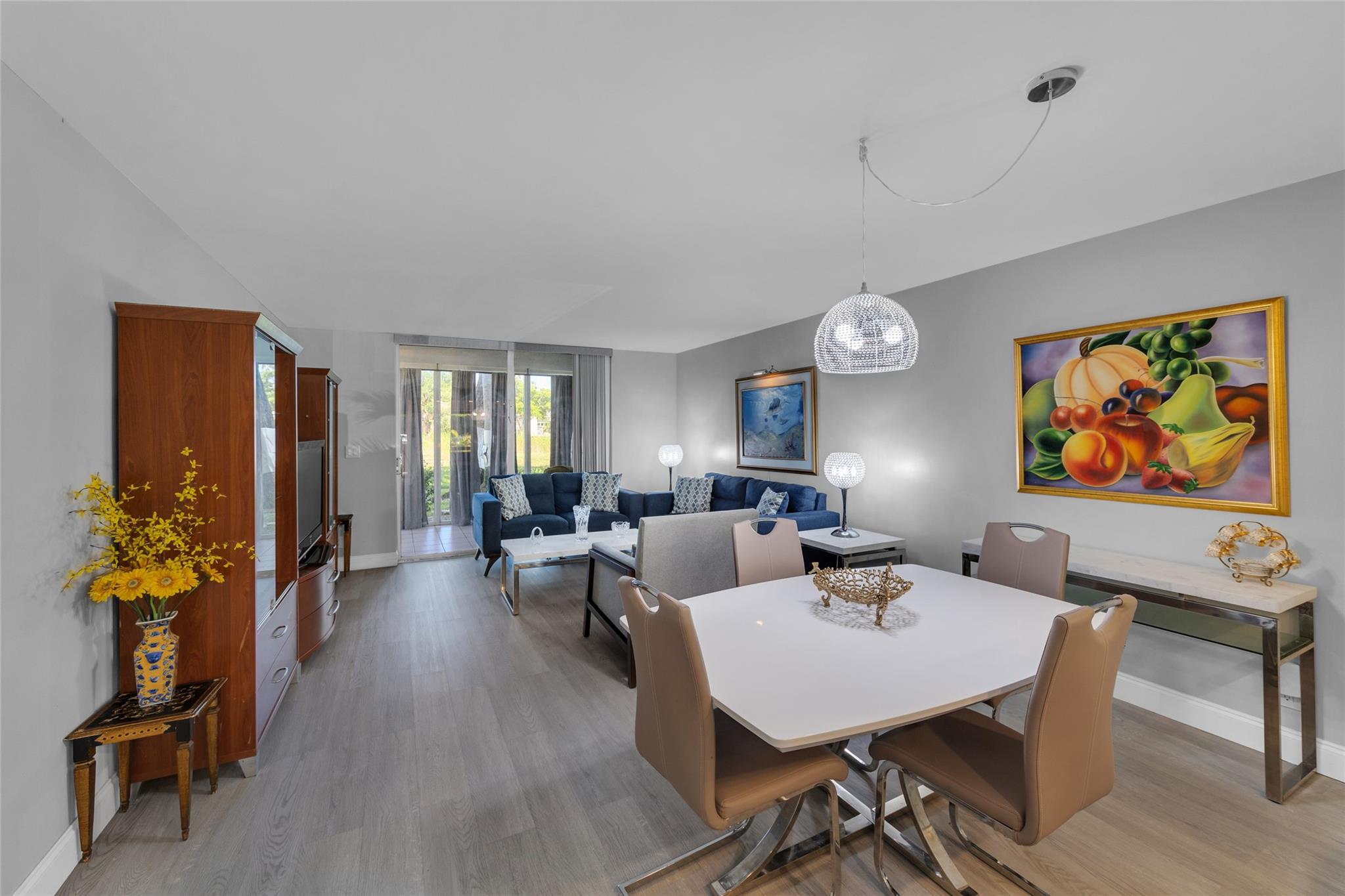 Beautifully maintained 2 bedroom 2 bathroom first-floor condo in a desirable 55+ community. Located in prime location of Margate near Publix, top shopping, dining, and just 5 minutes from Coral Square Mall. Features include impact windows, a modern kitchen with in-unit washer/dryer, and two senior-friendly bathrooms. Enjoy a private fenced patio—perfect for gardening, outdoor dining, or relaxing. Spacious balcony/den has impact windows and offers flexible use as an office, guest room, or hobby space. Community is quiet, well-kept, and ideal for those seeking a peaceful, low-maintenance lifestyle. Close to parks, medical facilities, and major roads for easy access to the turnpike. Move-in ready and waiting for you to call it home!