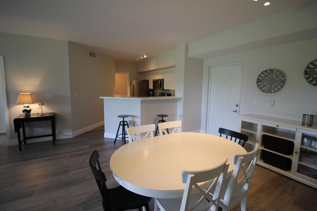 Photo of 11720 St Andrews Place #203, Wellington, FL 33414 (MLS # R10980432)