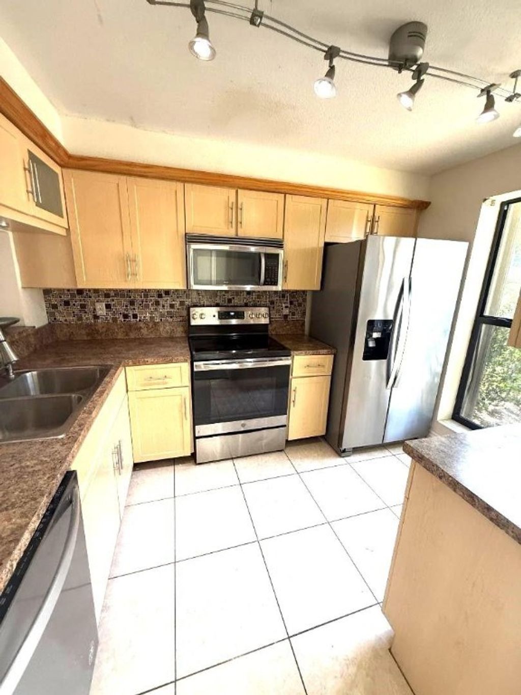 Photo of 3070 S Oakland Forest Drive #306, Oakland Park, FL 33309 (MLS # F10548305)