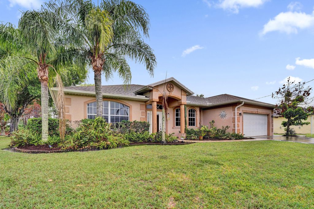 Photo of 5825 NW Zenith Drive, Port Saint Lucie, FL 34986 (MLS # B26022197)