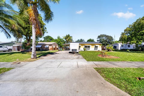 Photo of 5730 NE 6th Terrace, Oakland Park, FL 33334 (MLS # B26018294)