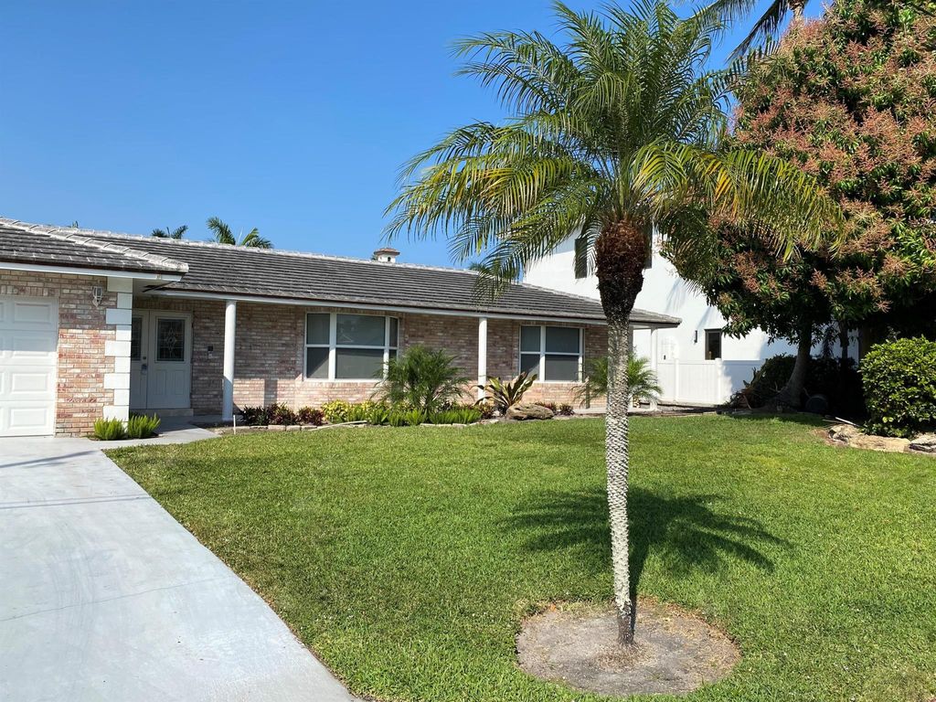 Photo of 925 Cypress Drive, Delray Beach, FL 33483 (MLS # R10869452)