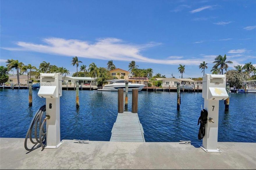 Discover waterfront living on the Intracoastal with this modern townhome featuring a private deeded 30+ft boat slip. This turnkey furnished residence offers 3 bedrooms and 3.5 baths across four levels with soaring ceilings, floor-to-ceiling windows, a chef's kitchen with Italian cabinetry and marble finishes, Crestron smart home technology, and a private elevator. Enjoy spectacular marina views from the rooftop terrace or relax on your private balconies. A boaters dream with an exclusive deeded dock with quick Intracoastal and ocean access. Just minutes from beaches, dining, and boutique shopping, this move in ready home delivers luxury, convenience, and the ultimate boating lifestyle.