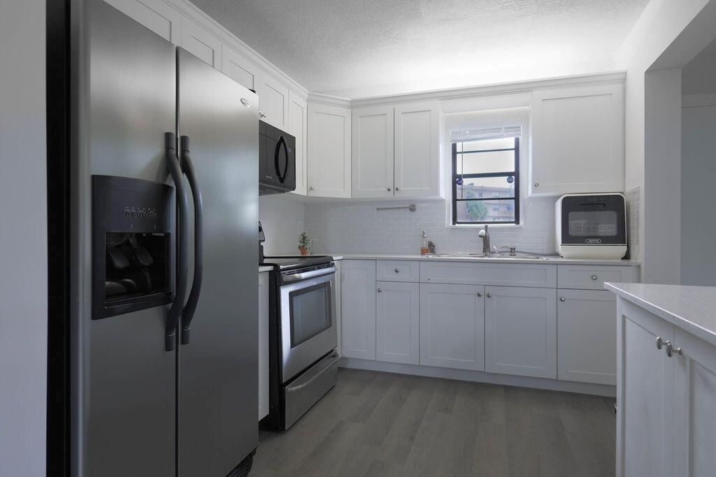 Photo of 9273 SW 8th Street #109, Boca Raton, FL 33428 (MLS # R11006877)