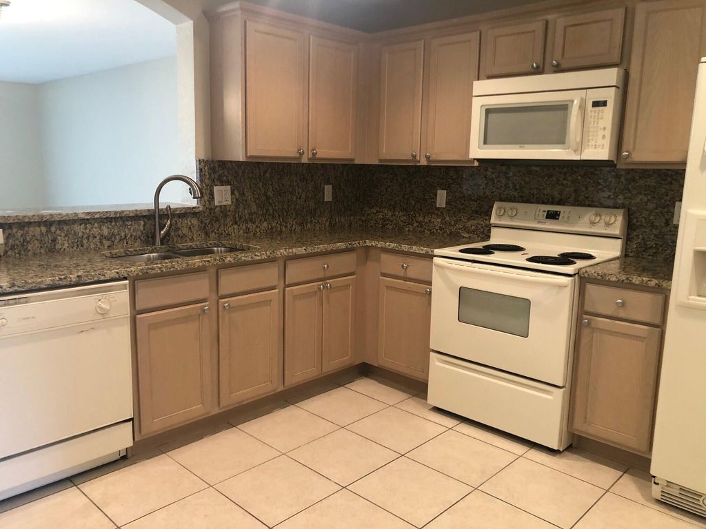 Photo of 8055 Big Pine Way, Riviera Beach, FL 33407 (MLS # R11007762)