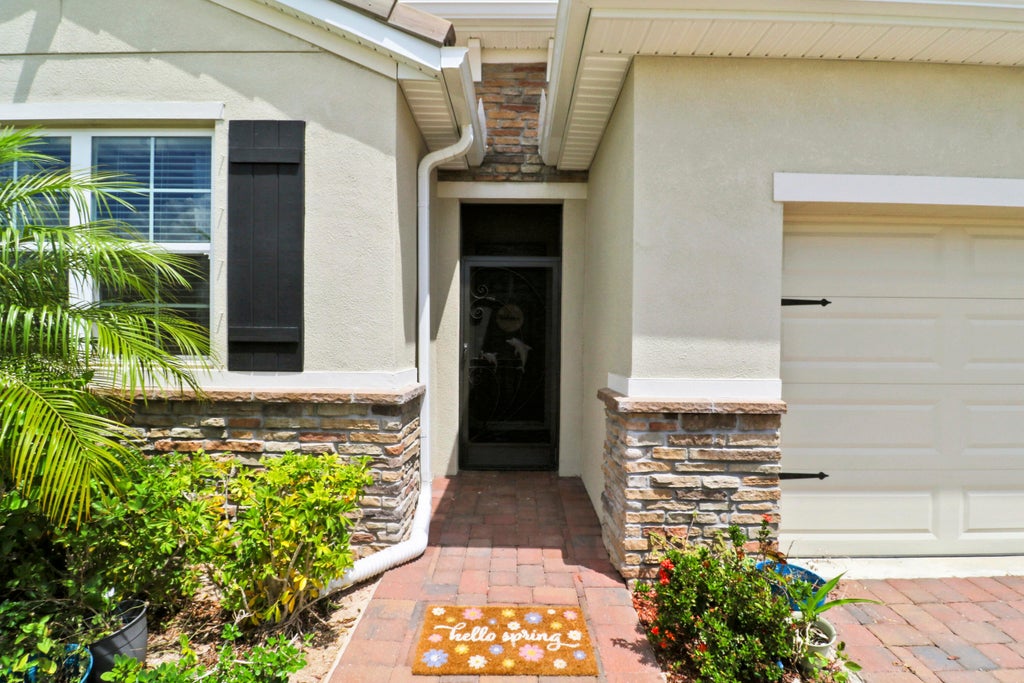 Photo of 10511 SW Toren Way, Port Saint Lucie, FL 34987 (MLS # B26028626)
