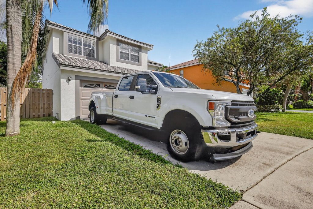 Photo of 7581 Bristol Bay Lane, Lake Worth, FL 33467 (MLS # R11134350)