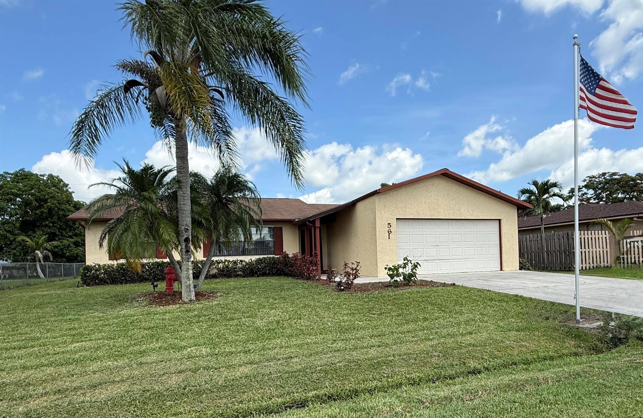 Come see this 3-bedroom, 2-bathroom, 2 car garage home featuring a split floor plan and plenty of space for comfortable living. Located in the heart of Port St. Lucie with NO HOA FEES, this property offers both convenience and freedom. Step inside to find tile flooring throughout, making for easy maintenance. The large and spacious master bedroom is a true retreat, complete with an en-suite bathroom and ample closet space. The two additional bedrooms are perfect for guests, family, or a home office. Enjoy Florida living on the expansive screened-in back patio, ideal for relaxing or entertaining year-round. A brand-new roof is being installed this week and comes with a 10-year warranty giving you peace of mind for years to come.