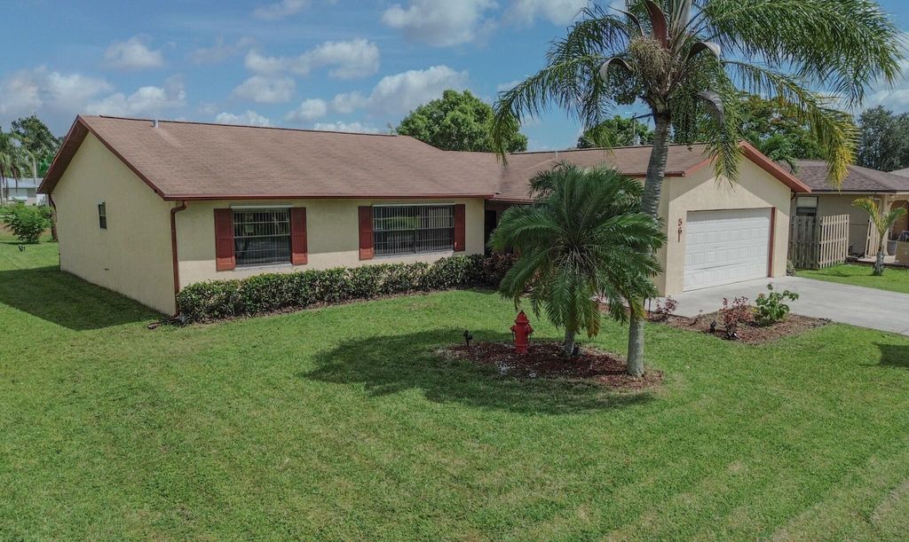 Photo of 561 SE Marydale Terrace, Port Saint Lucie, FL 34983 (MLS # R11105523)