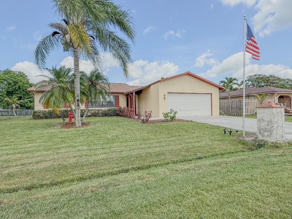 Photo of 561 SE Marydale Terrace, Port Saint Lucie, FL 34983 (MLS # R11105523)