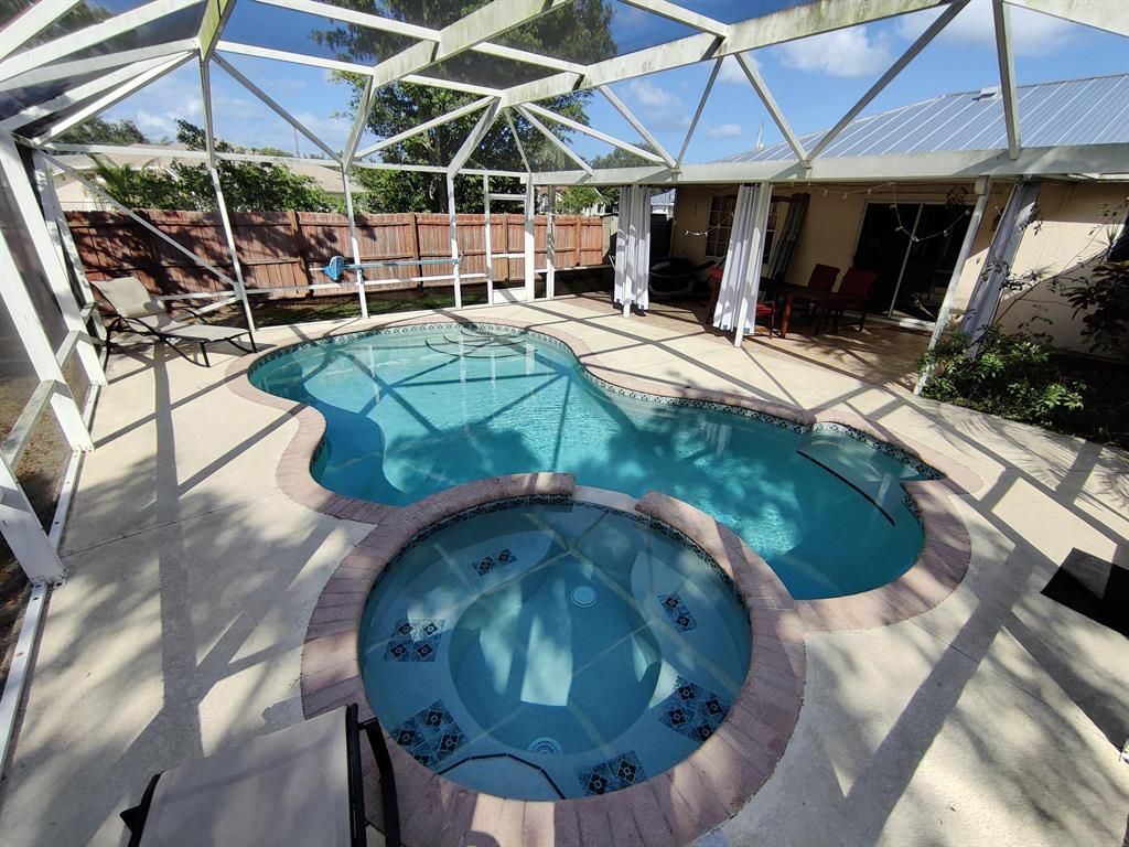 Photo of 1889 SE Gaskins Circle, Port Saint Lucie, FL 34952 (MLS # R10717208)
