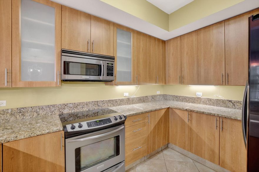 Spacious 2BR/2.5BA townhome with oversized loft/office area (larger than standard units). Kitchen features stainless steel appliances and granite countertops. Located on the main promenade at Wilton Station and just the second unit from the end by the river, offering peaceful river views. Tile flooring on the first level and engineered wood flooring upstairs. Private balconies off both bedrooms. Includes 1 underground garage parking space plus 1 additional assigned space outside. Resort-style pool and large clubhouse with gym, media room, billiards, library, warming kitchen, and party rooms. Bicycle and kayak/canoe storage available. HOA includes internet, cable, master insurance, water, sewer, trash, landscaping, gatehouse, pool, clubhouse, and management. Gated, pet-friendly community