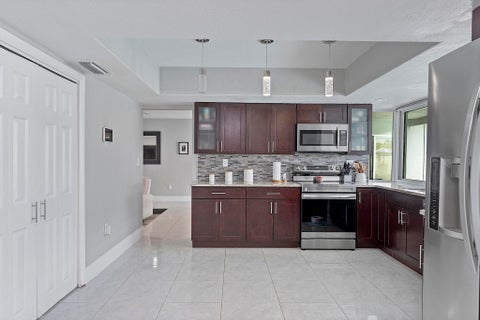 Tiny photo for 10476 NW 3rd Street, Plantation, FL 33324 (MLS # B26036069)