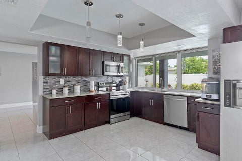Tiny photo for 10476 NW 3rd Street, Plantation, FL 33324 (MLS # B26036069)