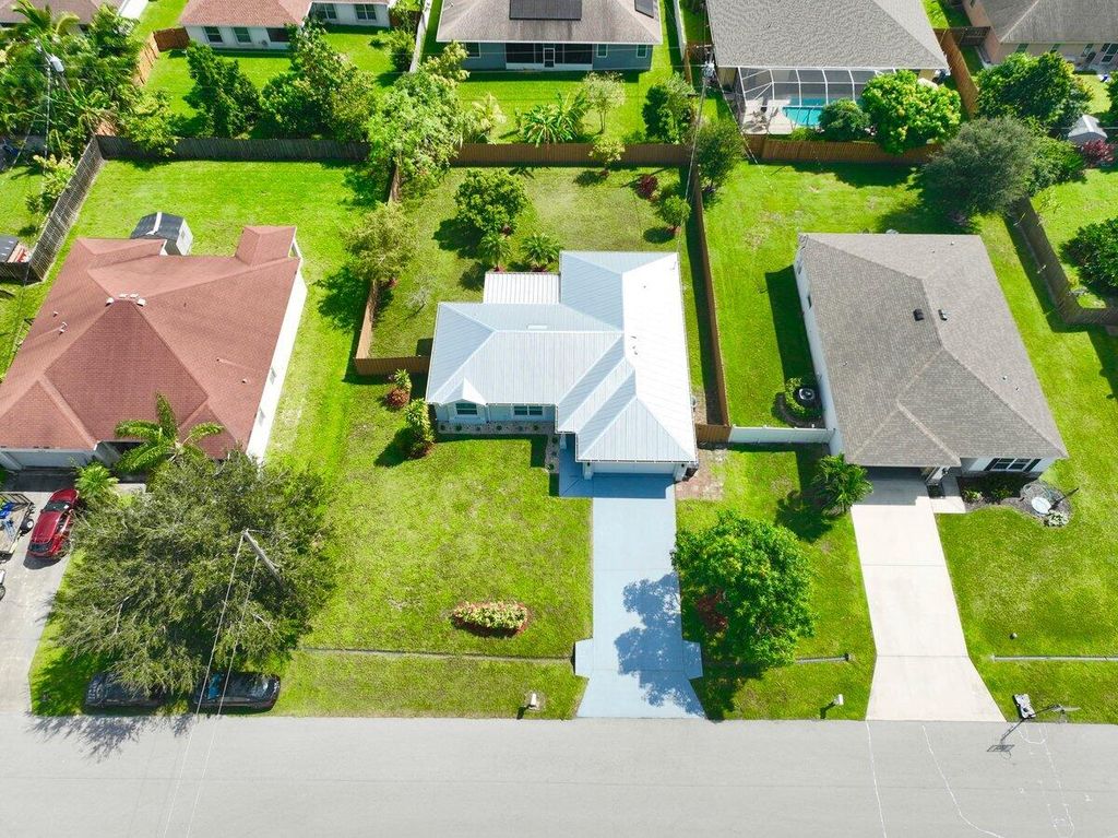 Photo of 4181 SW Rardin Street, Port Saint Lucie, FL 34953 (MLS # R11028686)