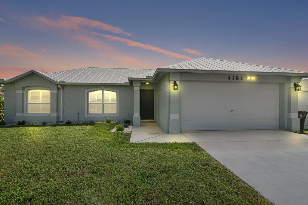 Photo of 4181 SW Rardin Street, Port Saint Lucie, FL 34953 (MLS # R11028686)