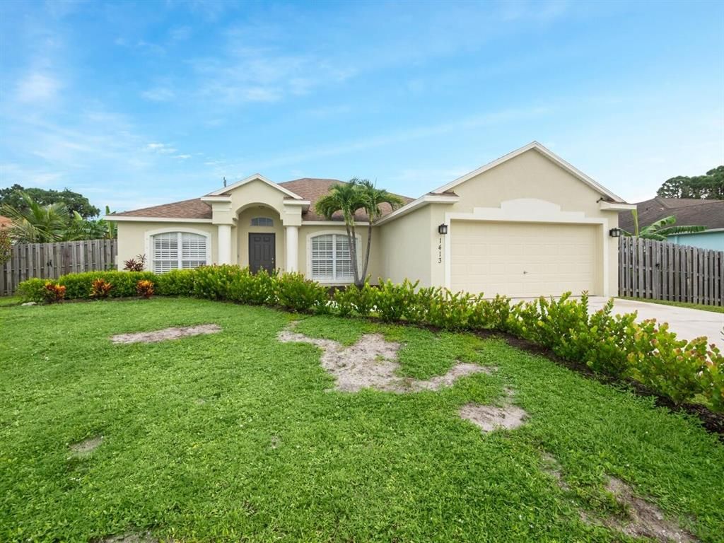 Photo of 1413 SW Aragon Avenue Ave, Port St Lucie, FL 34953 (MLS # R10744363)