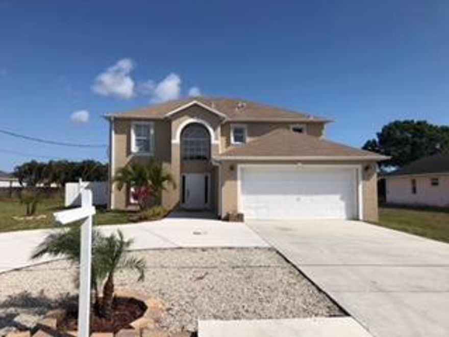 Beautifully 2 Story CBS home, Great location close to school,minutes to the turnpike and 1-95, Large kitchen has solid wood cabinets, granite counter tops, NEW Stainless Steel appliances, Kitchen is open to family room. Tile downstairs and laminate upstairs. Large beautiful master bedroom,walk-in-closet, and upgrade bathroom with dual vanities, screened patio was build 2017 with big yard for entertainment  with privacy. Two car attached garage and newly circular driveway, park your boat and RV, Accordion Shutters, to see it is to love it.