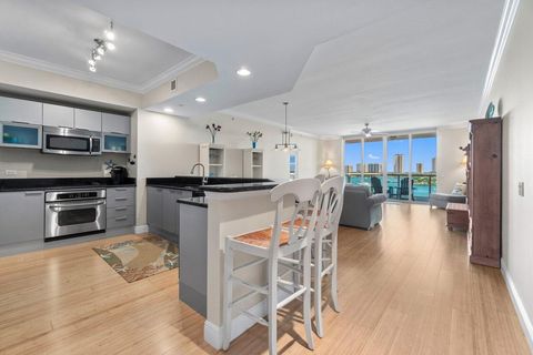 Photo of 2640 Lake Shore Drive #708, Riviera Beach, FL 33404 (MLS # R11073968)