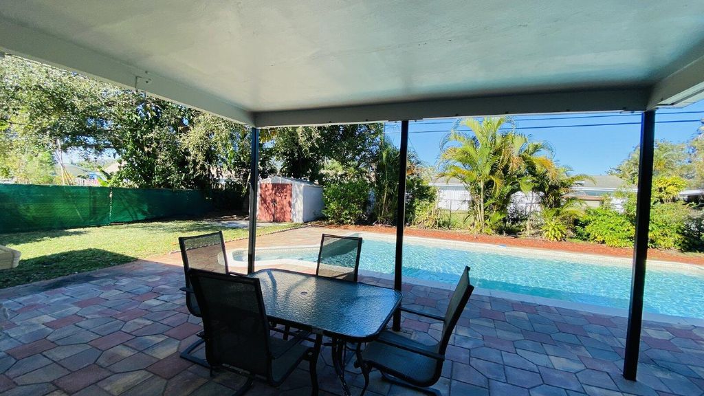 Photo of 297 Camellia Street, Palm Beach Gardens, FL 33410 (MLS # R10989087)