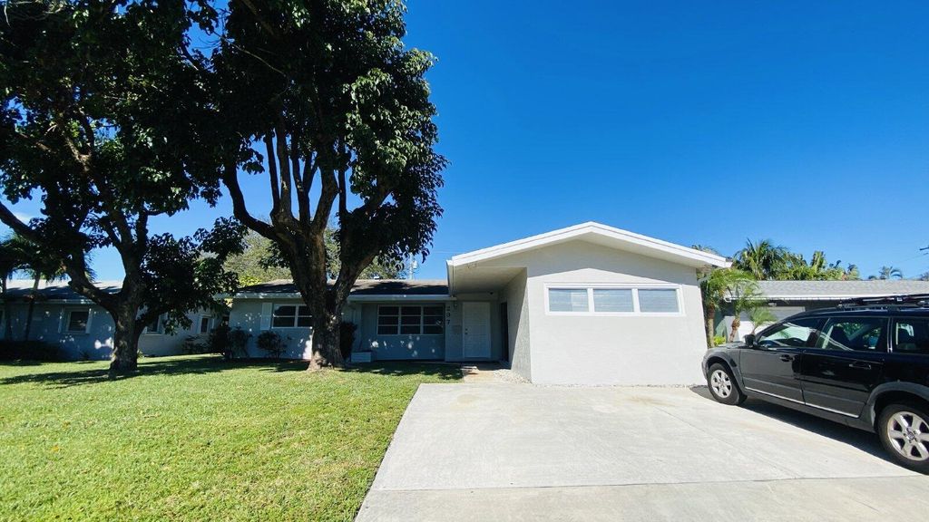 Photo of 297 Camellia Street, Palm Beach Gardens, FL 33410 (MLS # R10989087)