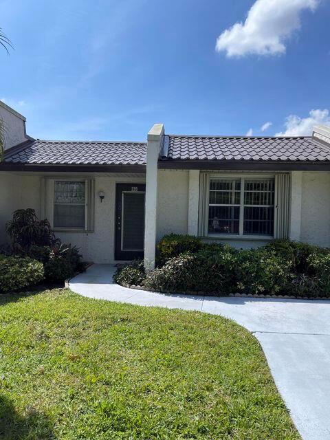 Come live the life in beautiful South Florida, at Golden Lakes Village! The community center features a two heated pools,(One easy to walk to) pickleball, tennis, gym, HBO TV & internet, clubhouse amenities, & catering to those 55+, this property offers a lifestyle of comfort & convenience. Simply move in & start enjoying the epitome of luxury living! The villa is all tiled with full size washer and dryer. Both bedroom's have ample closets. Large back porch with stunning lake views. Looking for long term tenants. The community has a fast approval available. Call Glenn to set up a viewing before it's go