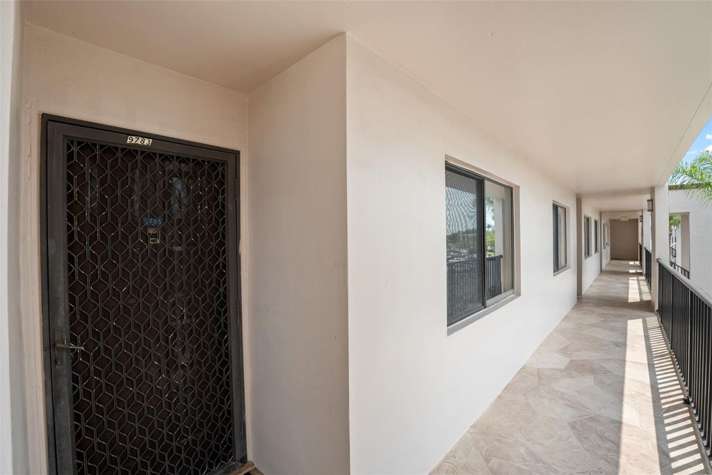 Photo of 9783 N Belfort Circle #309, Tamarac, FL 33321 (MLS # B26017171)