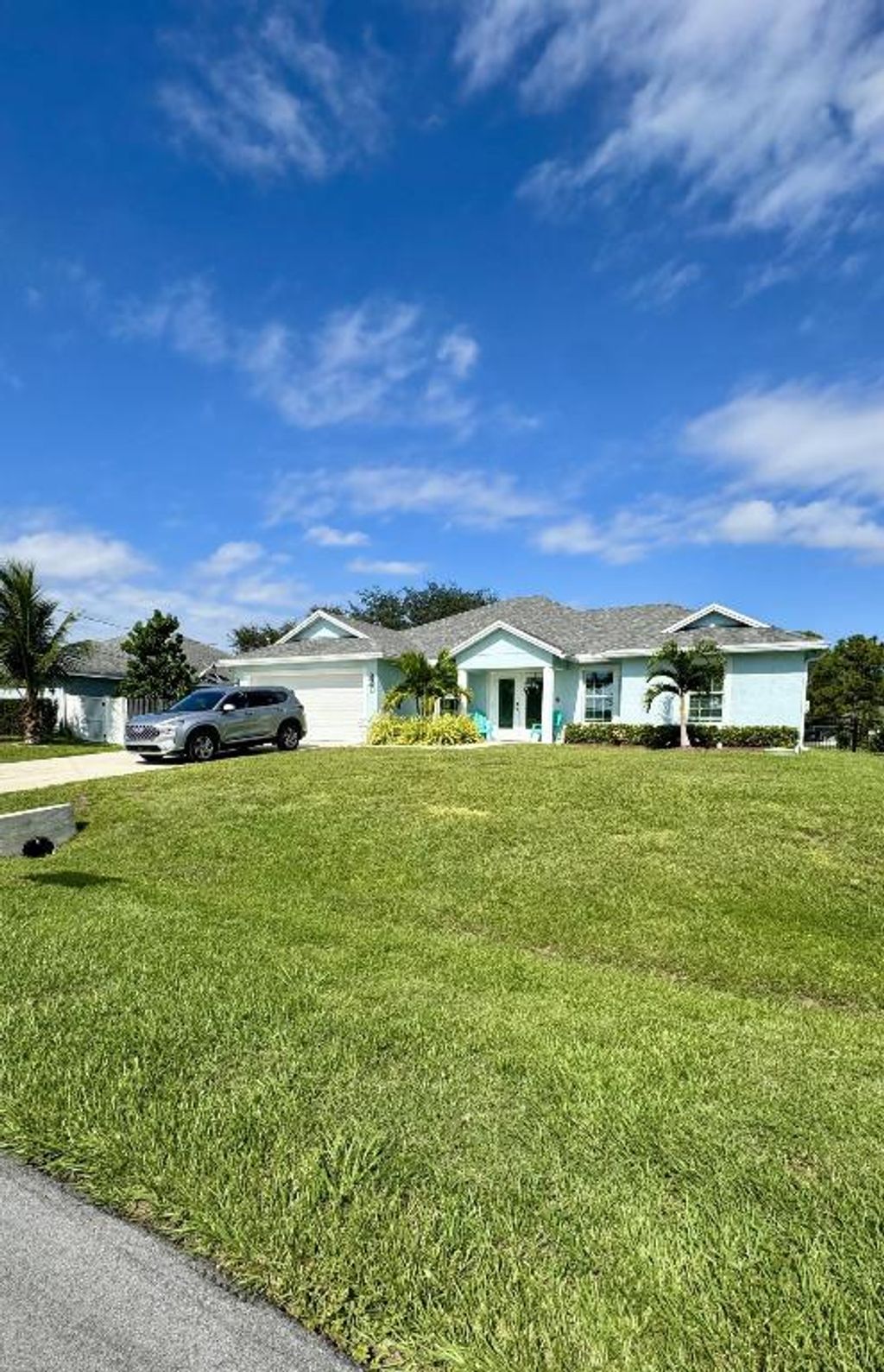 Photo of 1801 SW Dalmatian Avenue, Port Saint Lucie, FL 34953 (MLS # R11137707)